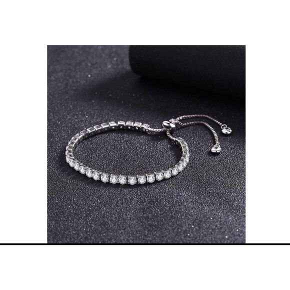 Boutique Jewelry - Gorgeous 8 Ct. Round Cut Sim Diamond Bolo Tennis Bracelet~18KWGP~New